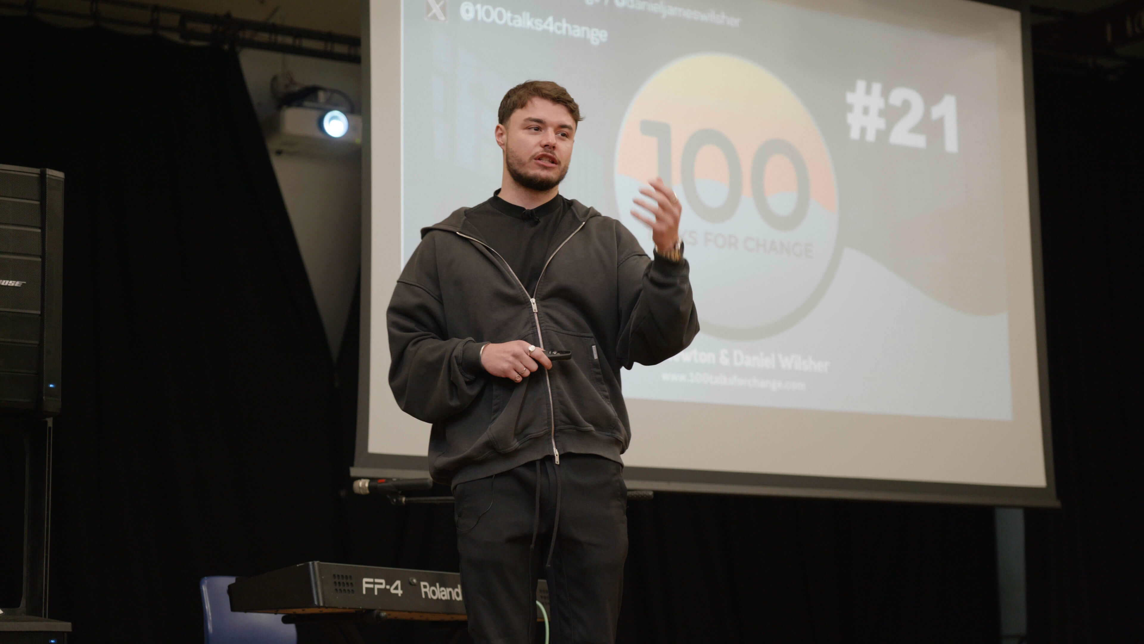 Talks for change, man giving a presentation